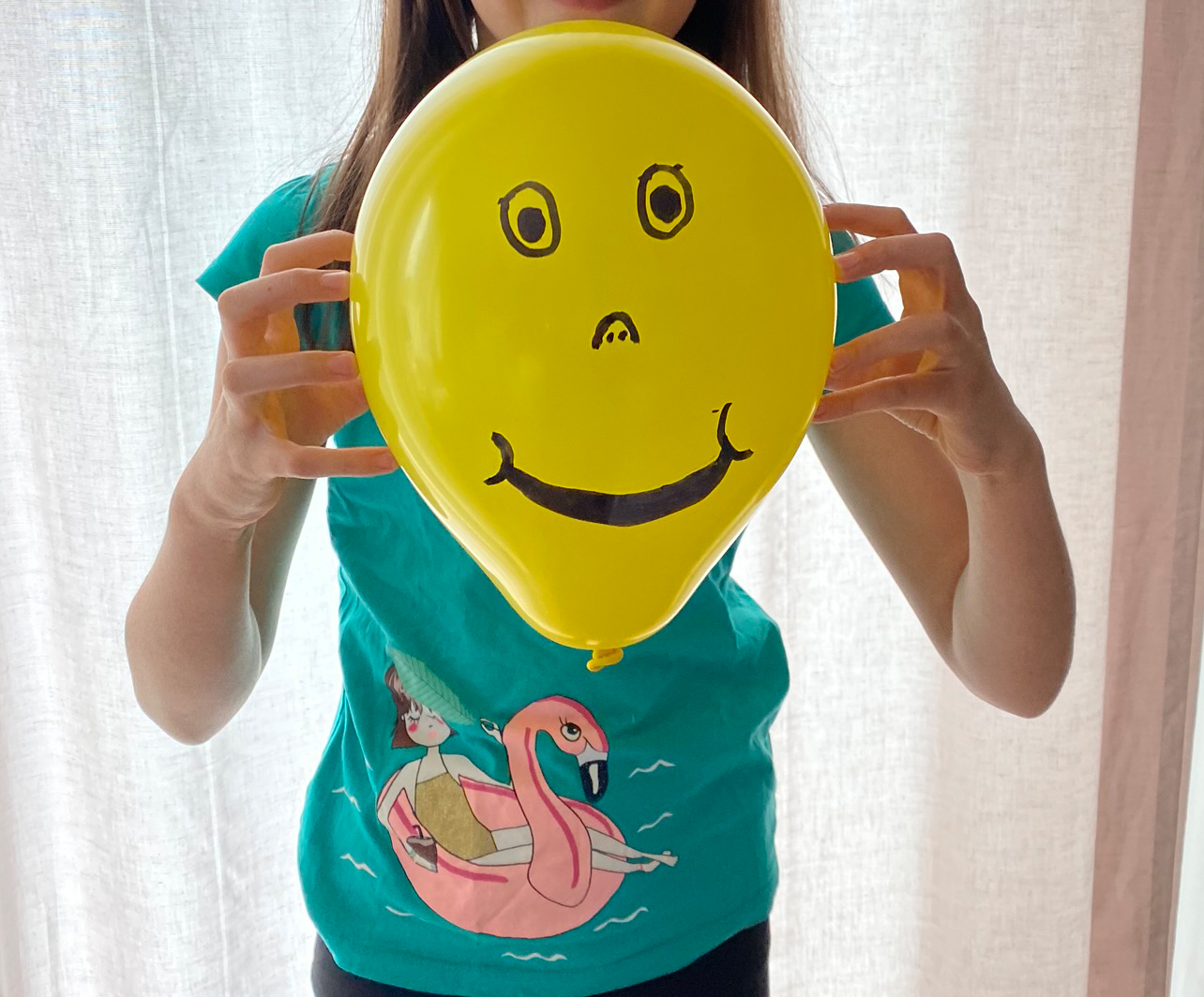 Luftballon mit Gesicht